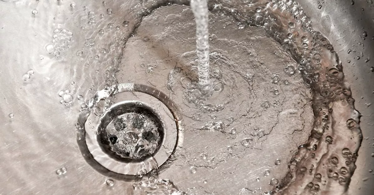 Sink successfully unblocked by Newbury Drainage, with water flowing smoothly down the drain