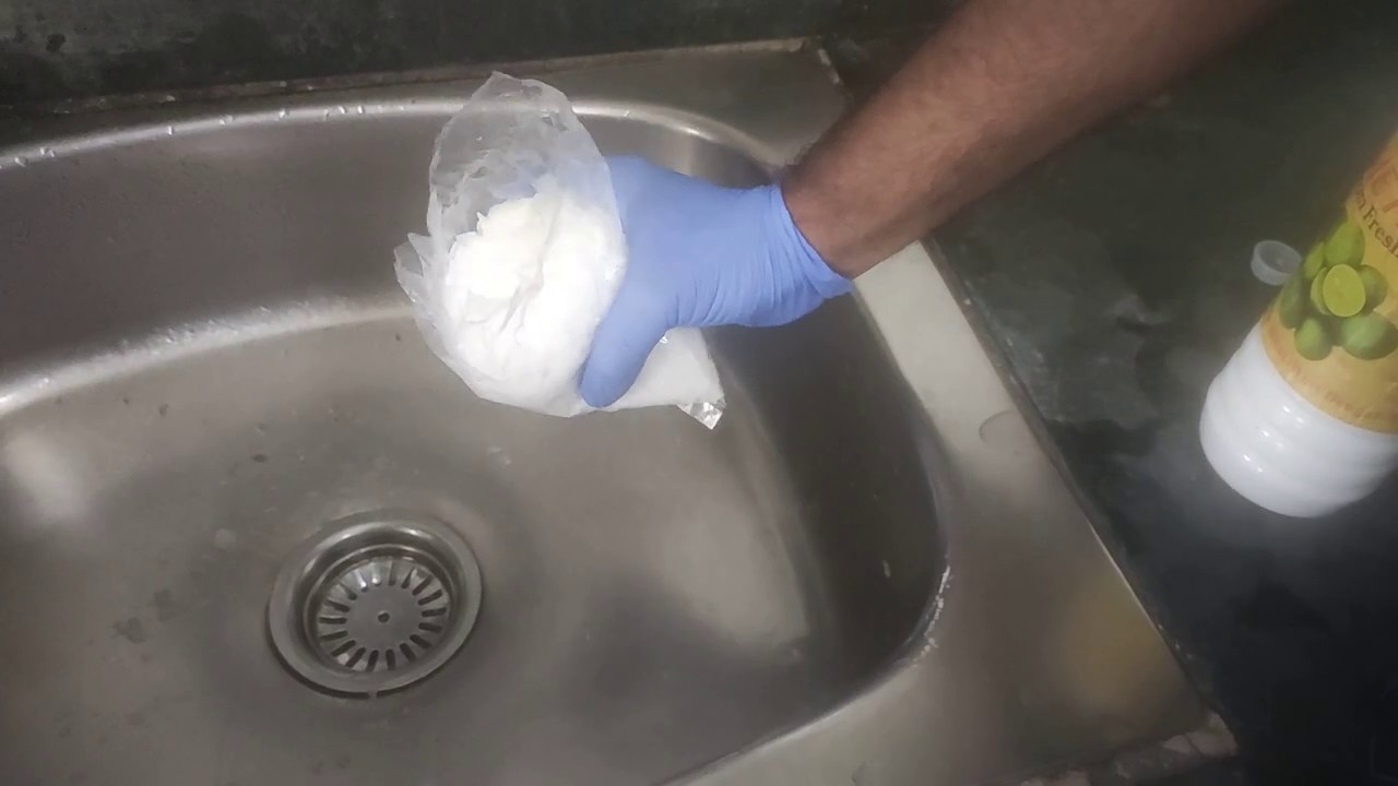 how to use caustic soda to unblock drain